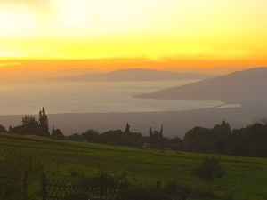 Upcountry sunset with a view of Lanai in the distance.