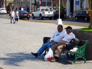 Two chileans having a chat in the shade.  