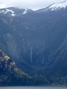 This waterfall is at least 4000-5000 feet.  It begins at the snow on top and reaches all the way to the sea.