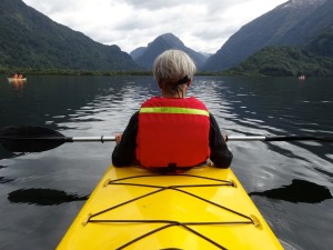 In my kayak with a view to the lake I crossed to enter the river.  The kayaker pictured here shall remain unnamed at their request.