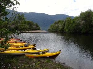 Taking a bread on the riverbank while kayaking.