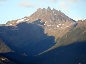 Setting sun on the surrounding mountains.