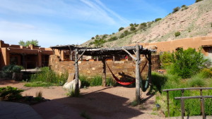 Hammocks abound the place as well.  Beyond this hammock is the semi private bath enjoyed by only the Pueblo and Cliffside Suite guests.