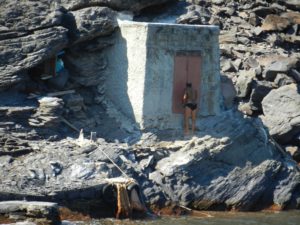 This is home to a man who as local folklore has it lost his young lover and retreated from the world to live here on this tiny island near Santorini.